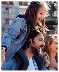 Close up of a young happy family exploring the Rossio Square